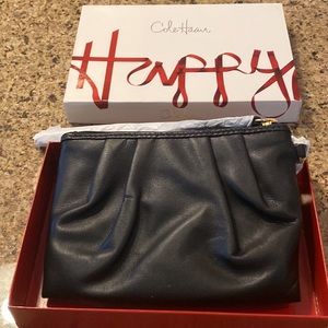 Cole Hasn leather  new never used wristlet.